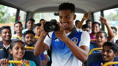 Jayden 'Grootman' Adams is capturing the essence of TS Galaxy FC's journey through his unique role as the bus parade...